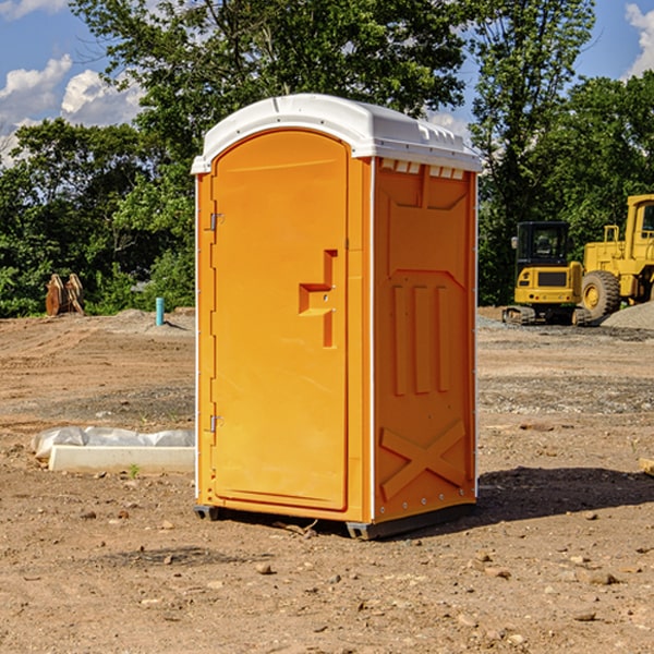 how often are the portable restrooms cleaned and serviced during a rental period in Okaloosa County